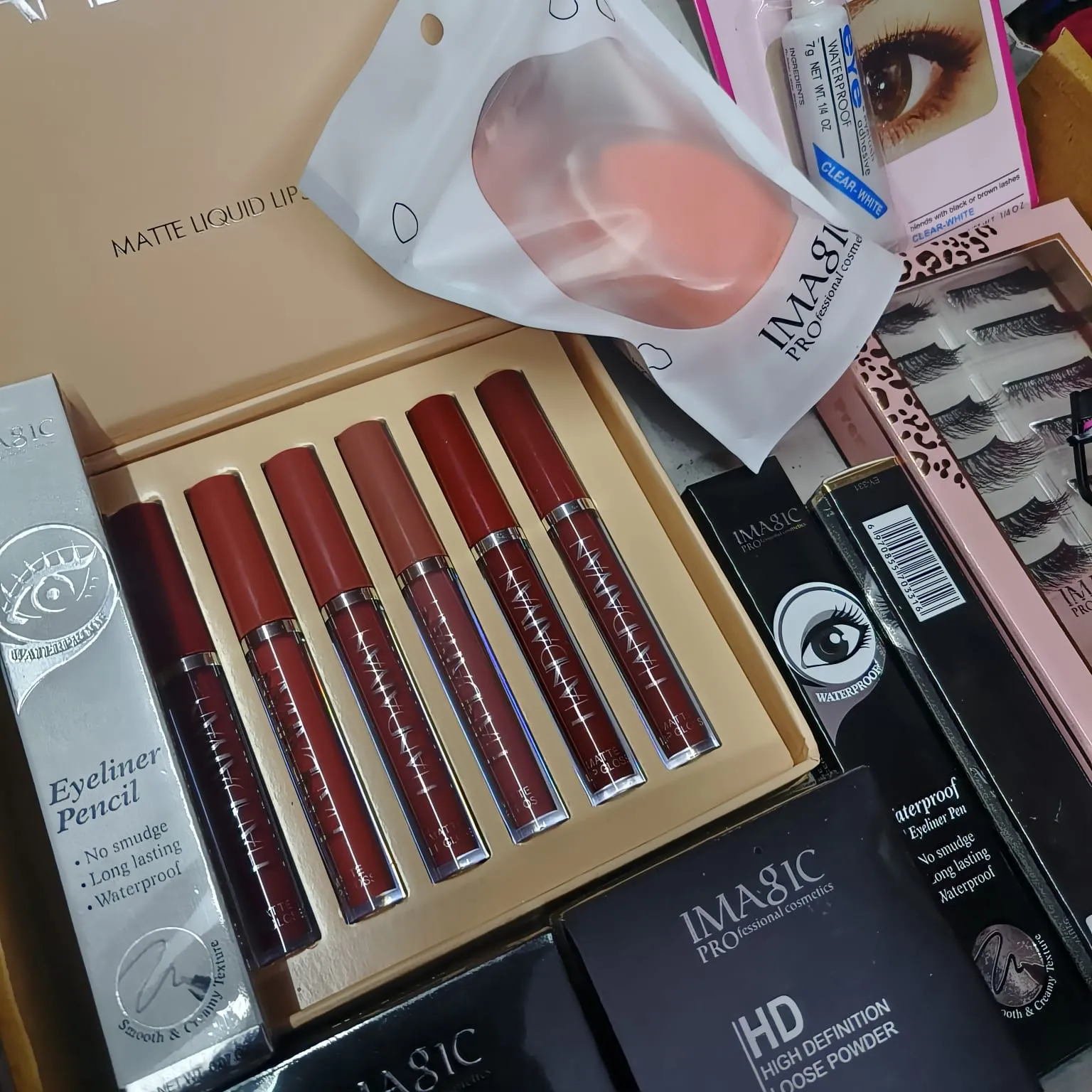 (10 in 1 Combo)  Imagic Mascara   HANDAIYAN Lipstick 6PCS   Eyeliner   Imagic Loose Powder   Imagic Eyelashes   Eyelashes Curler   Eyelashes Glue   Sponge